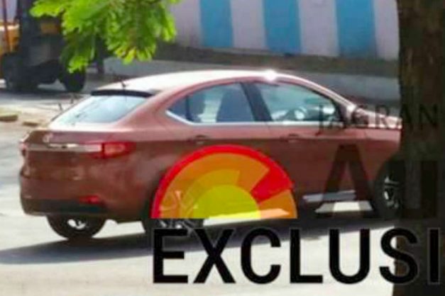 tata-tigor-sedan-sunburst-orange-rear-back-pictures-photos-images-snaps